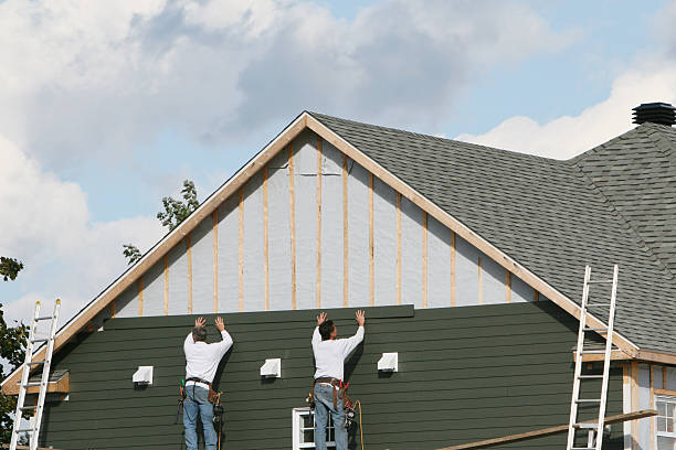 Professional Siding technician working in Oxford, IN